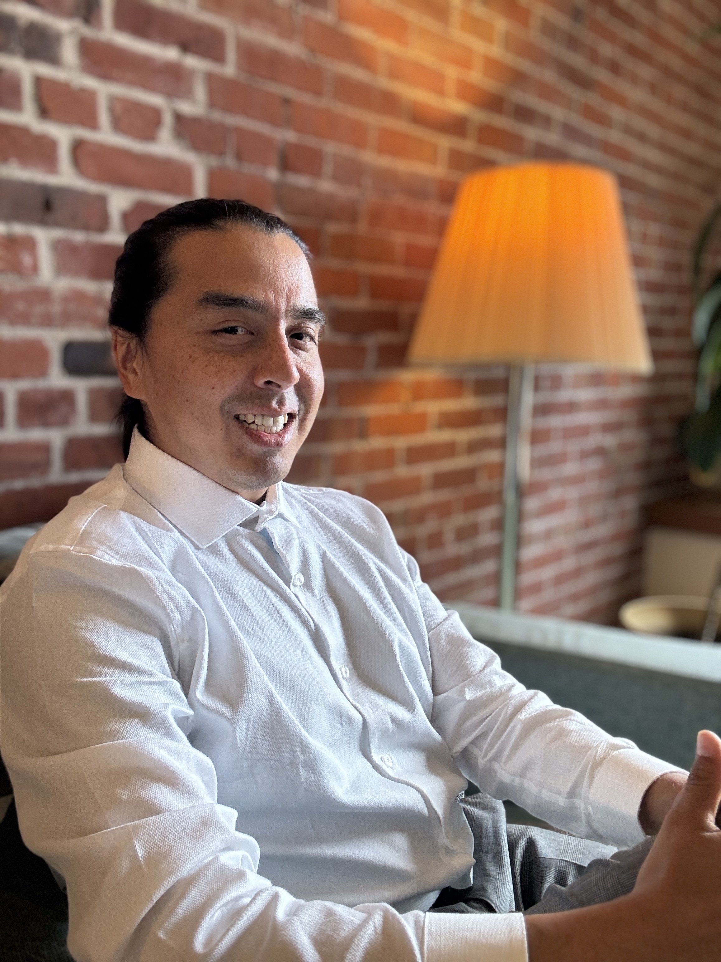 Carlos Encalada, seated in his office